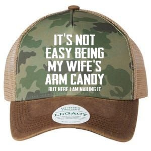 Its Not Easy Being My Wifes Arm Candy Legacy Tie Dye Trucker Hat