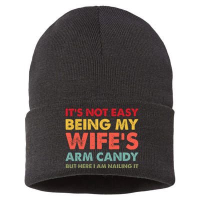 ItS Not Easy Being My WifeS Arm Candy Retro Funny Husband Sustainable Knit Beanie