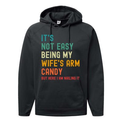 Its Not Easy Being My Wifes Arm Candy But Here I Am Nailin Performance Fleece Hoodie