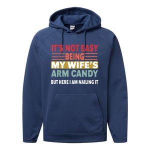 Its Not Easy Being My Wifes Arm Candy But Here I Am Nailin Performance Fleece Hoodie