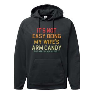 Its Not Easy Being My Wifes Arm Candy But Here I Am Nailin Performance Fleece Hoodie