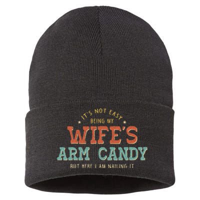 Its Not Easy Being My Wifes Arm Candy Here I Am Sustainable Knit Beanie