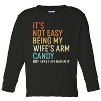 It's Not Easy Being My Wife's Arm Candy But Here I Am Nailin Toddler Long Sleeve Shirt