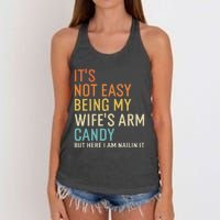 It's Not Easy Being My Wife's Arm Candy But Here I Am Nailin Women's Knotted Racerback Tank