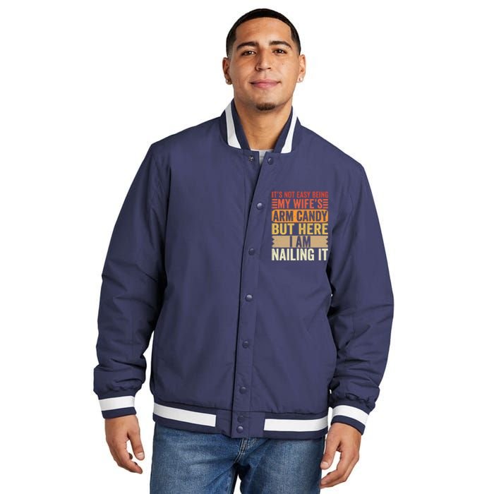 Its Not Easy Being My Wifes Arm Candy Fathers Day Insulated Varsity Jacket