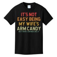 Its Not Easy Being My Wifes Arm Candy Fathers Day Kids T-Shirt