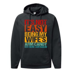 It's Not Easy Being My Wife's Arm Candy But Here I Am Nailin Performance Fleece Hoodie