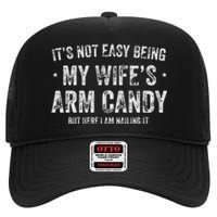 It's Not Easy Being My Wife's Arm Candy but here i am nailin High Crown Mesh Back Trucker Hat