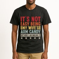Its Not Easy Being My Wifes Arm Candy Here I Am Nailing It Tall T-Shirt