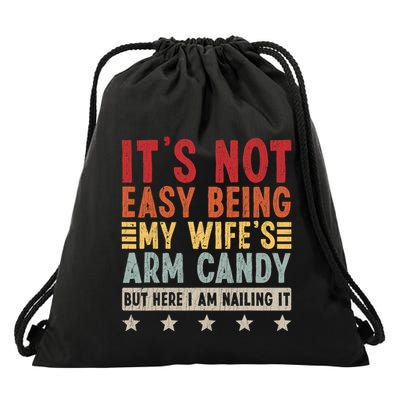 Its Not Easy Being My Wifes Arm Candy Here I Am Nailing It Drawstring Bag