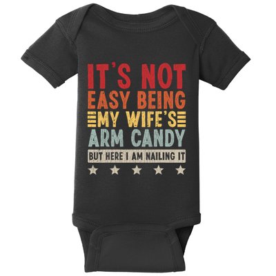 Its Not Easy Being My Wifes Arm Candy Here I Am Nailing It Baby Bodysuit