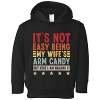 Its Not Easy Being My Wifes Arm Candy Here I Am Nailing It Toddler Hoodie