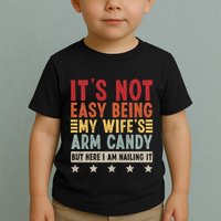 Its Not Easy Being My Wifes Arm Candy Here I Am Nailing It Toddler T-Shirt