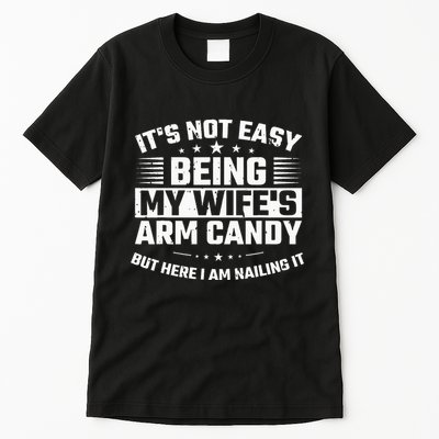 Its Not Easy Being My Wifes Arm Candy Here I Am Nailing It Tall T-Shirt