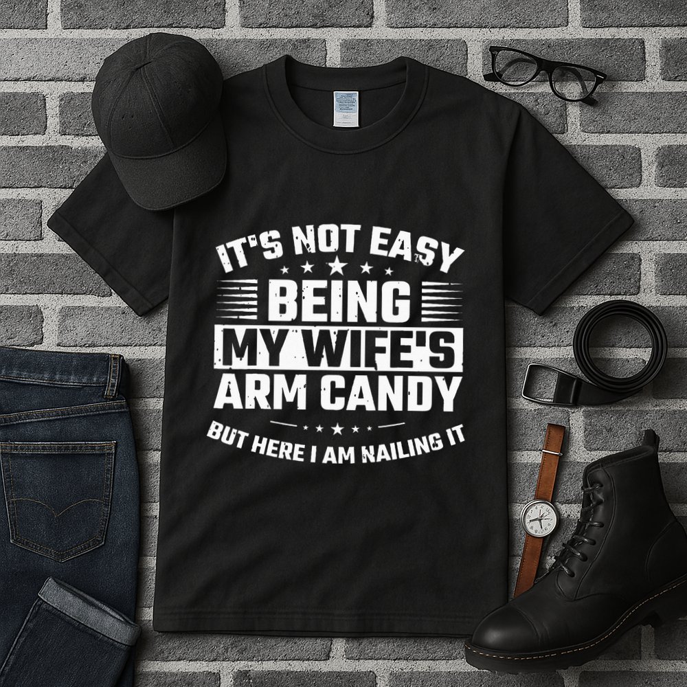 Its Not Easy Being My Wifes Arm Candy Here I Am Nailing It Tall T-Shirt