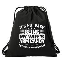 Its Not Easy Being My Wifes Arm Candy Here I Am Nailing It Drawstring Bag