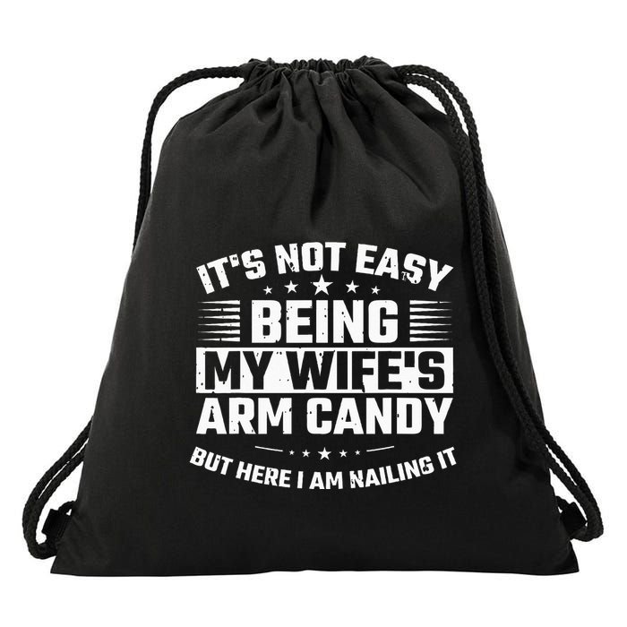Its Not Easy Being My Wifes Arm Candy Here I Am Nailing It Drawstring Bag