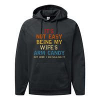 It's Not Easy Being My Wife's Arm Candy But Here I Am Nailing It Performance Fleece Hoodie