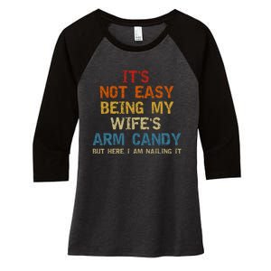 It's Not Easy Being My Wife's Arm Candy But Here I Am Nailing It Women's Tri-Blend 3/4-Sleeve Raglan Shirt