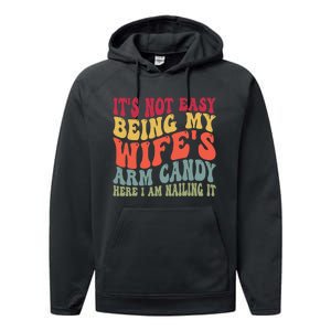 Its Not Easy Being My Wifes Arm Candy Here I Am Nailing It Performance Fleece Hoodie