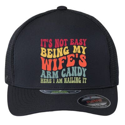 Its Not Easy Being My Wifes Arm Candy Here I Am Nailing It Flexfit Unipanel Trucker Cap