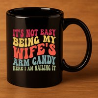 Its Not Easy Being My Wifes Arm Candy Here I Am Nailing It 11oz C Handle Ceramic Mug