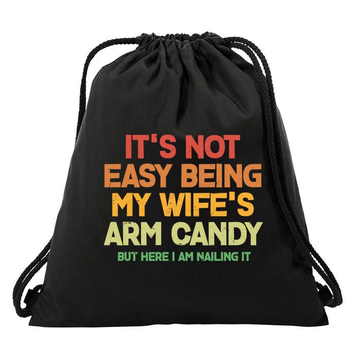 Its Not Easy Being My Wifes Arm Candy But Here I Am Nailing It Drawstring Bag