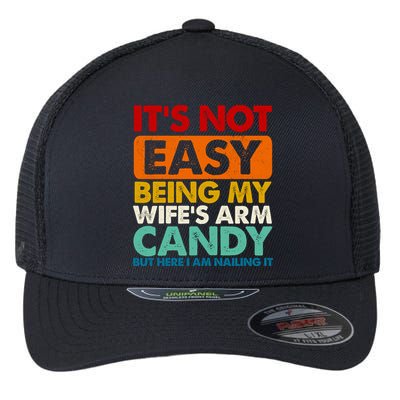 Its Not Easy Being My Wifes Arm Candy But Here I Am Funny Gift Flexfit Unipanel Trucker Cap