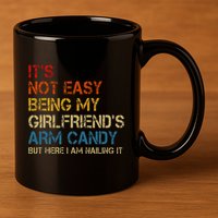 ItS Not Easy Being My GirlfriendS Arm Candy Am Nailing It 11oz C Handle Ceramic Mug