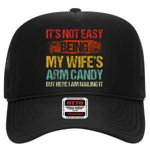 Its Not Easy Being My Wifes Arm Candy But Here I Am Nailin High Crown Mesh Back Trucker Hat