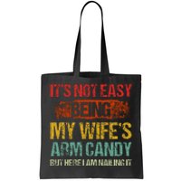 Its Not Easy Being My Wifes Arm Candy But Here I Am Nailin Tote Bag