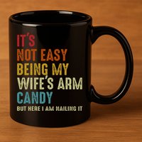 Its Not Easy Being My Wifes Arm Candy But Here I Am Nailin 11oz C Handle Ceramic Mug