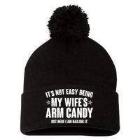 It's Not Easy Being My Wife's Arm Candy But Here I Am Nailing It Pom Pom 12in Knit Beanie