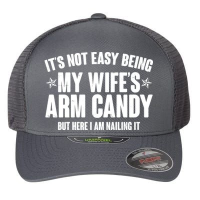 It's Not Easy Being My Wife's Arm Candy But Here I Am Nailing It Flexfit Unipanel Trucker Cap