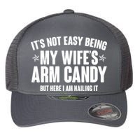 It's Not Easy Being My Wife's Arm Candy But Here I Am Nailing It Flexfit Unipanel Trucker Cap