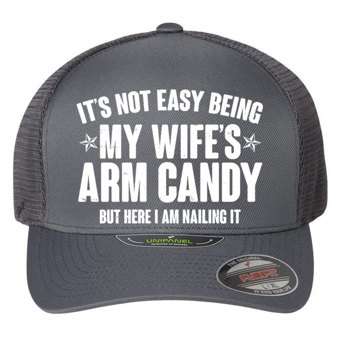 It's Not Easy Being My Wife's Arm Candy But Here I Am Nailing It Flexfit Unipanel Trucker Cap