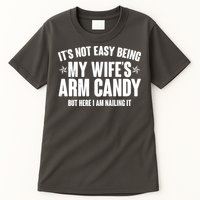 It's Not Easy Being My Wife's Arm Candy But Here I Am Nailing It Tall T-Shirt