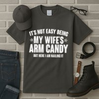 It's Not Easy Being My Wife's Arm Candy But Here I Am Nailing It Tall T-Shirt
