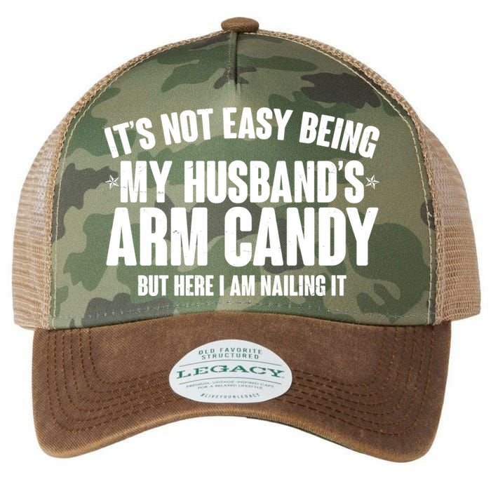 It's Not Easy Being My Husband's Arm Candy But Here I Am Nailing It Legacy Tie Dye Trucker Hat