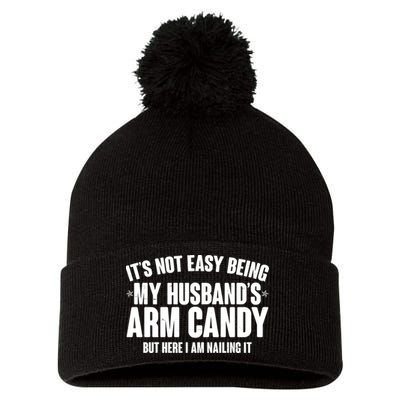 It's Not Easy Being My Husband's Arm Candy But Here I Am Nailing It Pom Pom 12in Knit Beanie