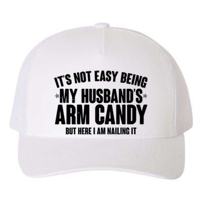 It's Not Easy Being My Husband's Arm Candy But Here I Am Nailing It Yupoong Adult 5-Panel Trucker Hat