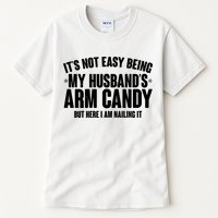It's Not Easy Being My Husband's Arm Candy But Here I Am Nailing It Tall T-Shirt