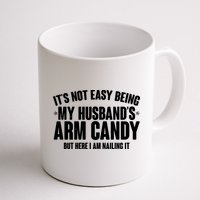 It's Not Easy Being My Husband's Arm Candy But Here I Am Nailing It Mug