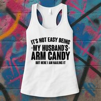 It's Not Easy Being My Husband's Arm Candy But Here I Am Nailing It Womens Tank Top