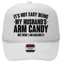 It's Not Easy Being My Husband's Arm Candy But Here I Am Nailing It Trucker Hat