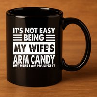 Its Not Easy Being My Wifes Arm Candy But Here I Am Nailing It Funny 11oz C Handle Ceramic Mug