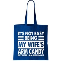 Its Not Easy Being My Wifes Arm Candy But Here I Am Nailing It Funny Bag