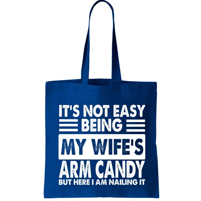 Its Not Easy Being My Wifes Arm Candy But Here I Am Nailing It Funny Bag
