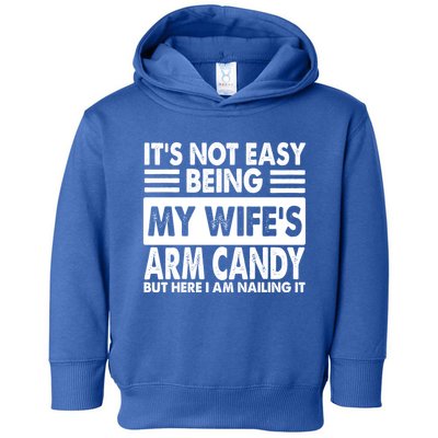Its Not Easy Being My Wifes Arm Candy But Here I Am Nailing It Funny Toddler Hoodie