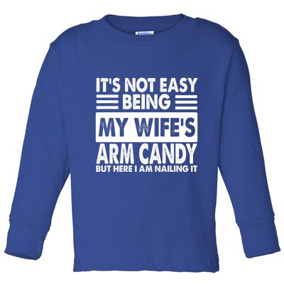 Its Not Easy Being My Wifes Arm Candy But Here I Am Nailing It Funny Toddler Long Sleeve Shirt